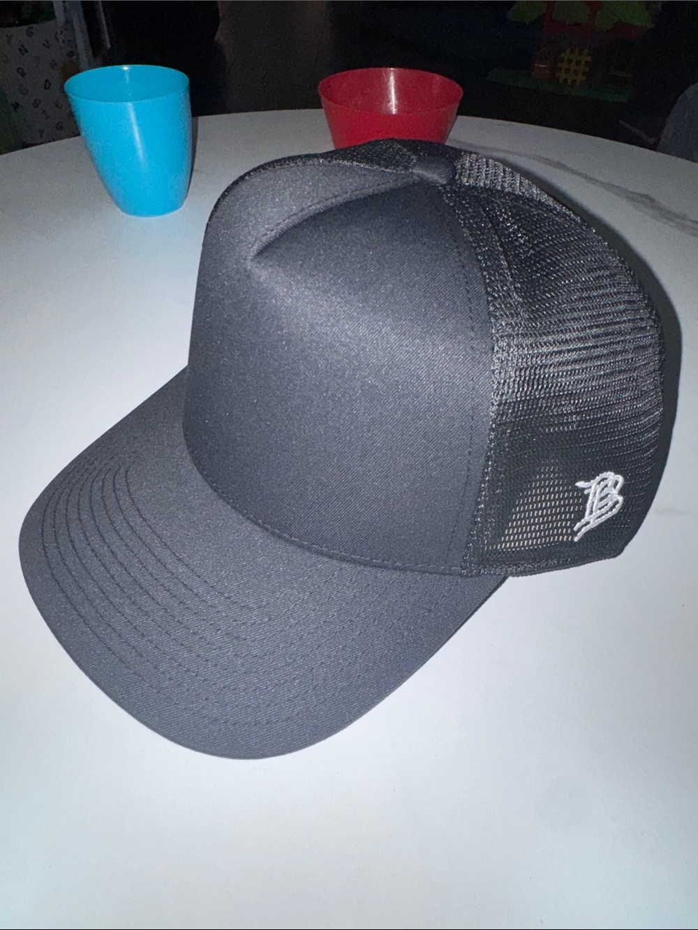 Branded Bills Black Mesh Trucker Cap with White 'B' Logo - Men Grooming